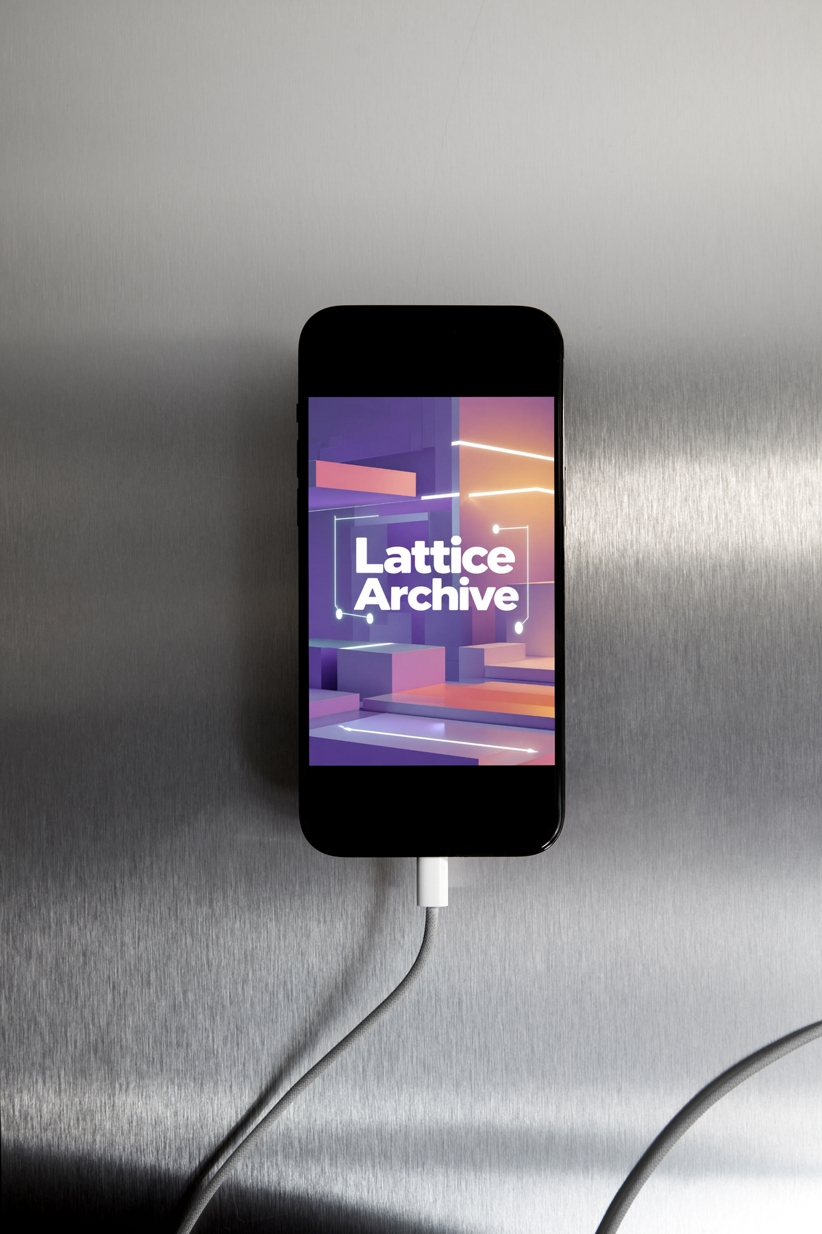 A black smartphone lying on a brushed metal surface, connected to a white charging cable. The phone screen displays the 'Lattice Archive' logo over a purple and orange abstract geometric graphic.